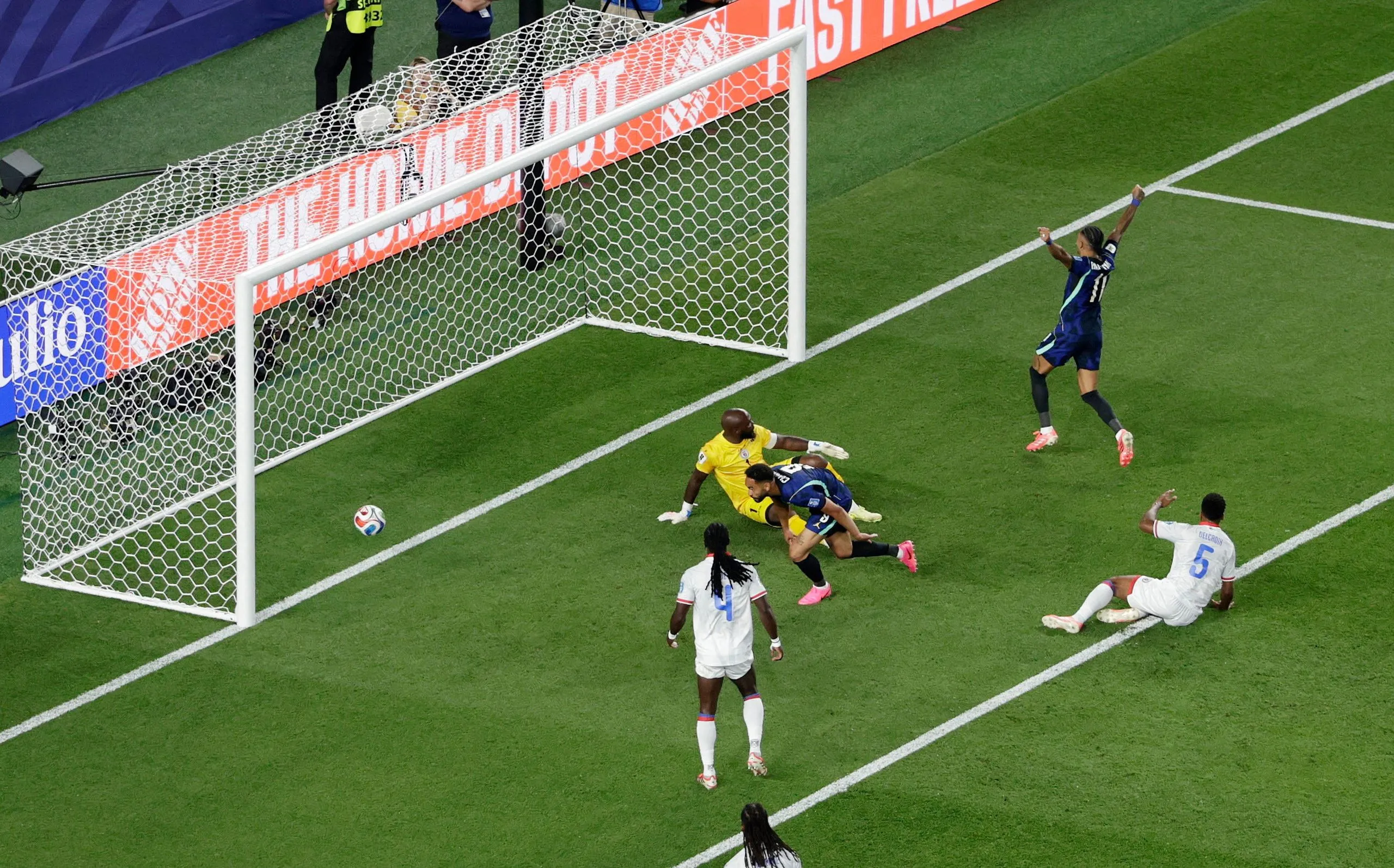 Brazil’s Matheus Cunha scores their first goal