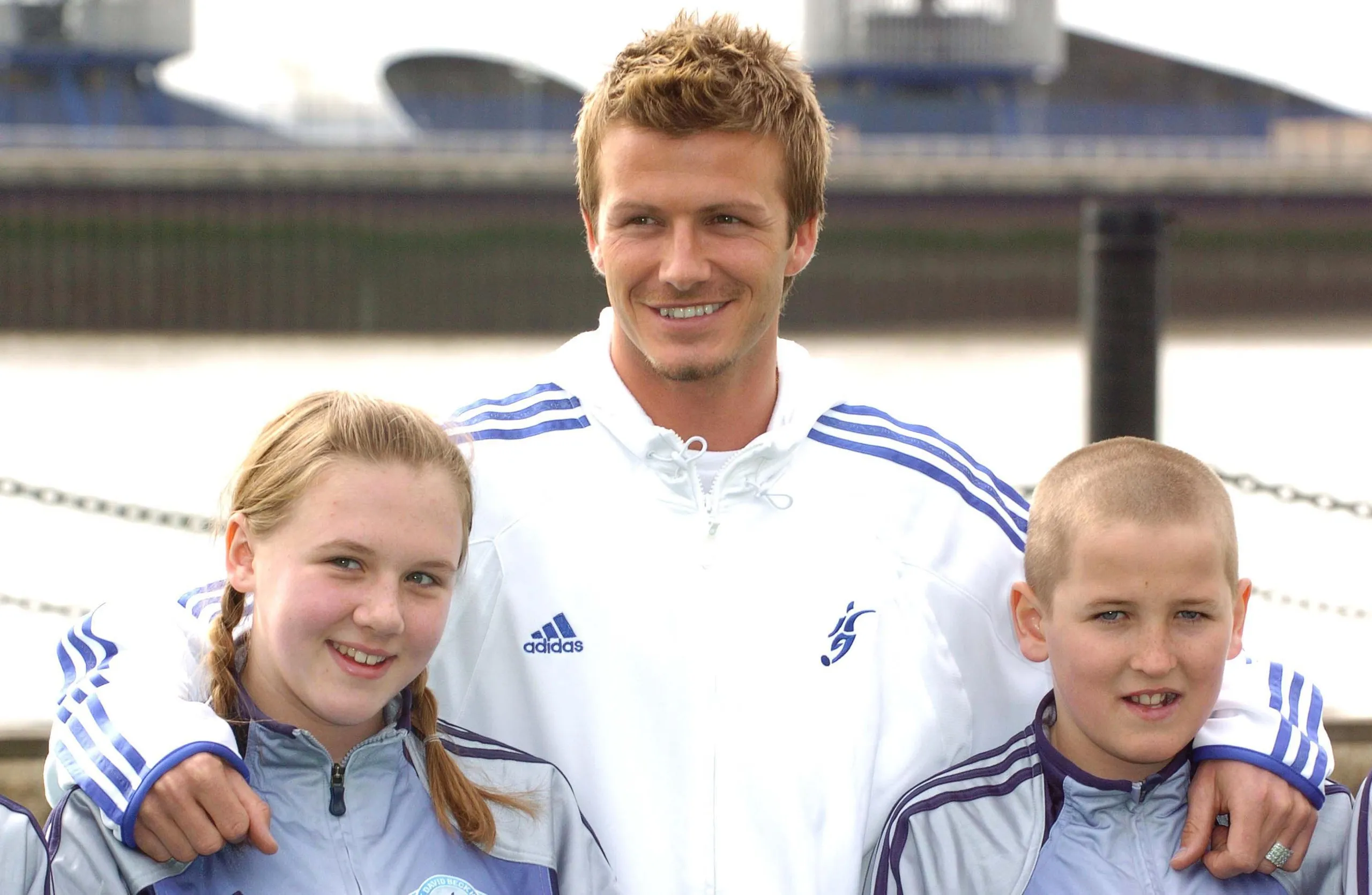 Harry Kane with Katie Goodland and David Beckham at the launch of Beckham’s football academy in 2005.