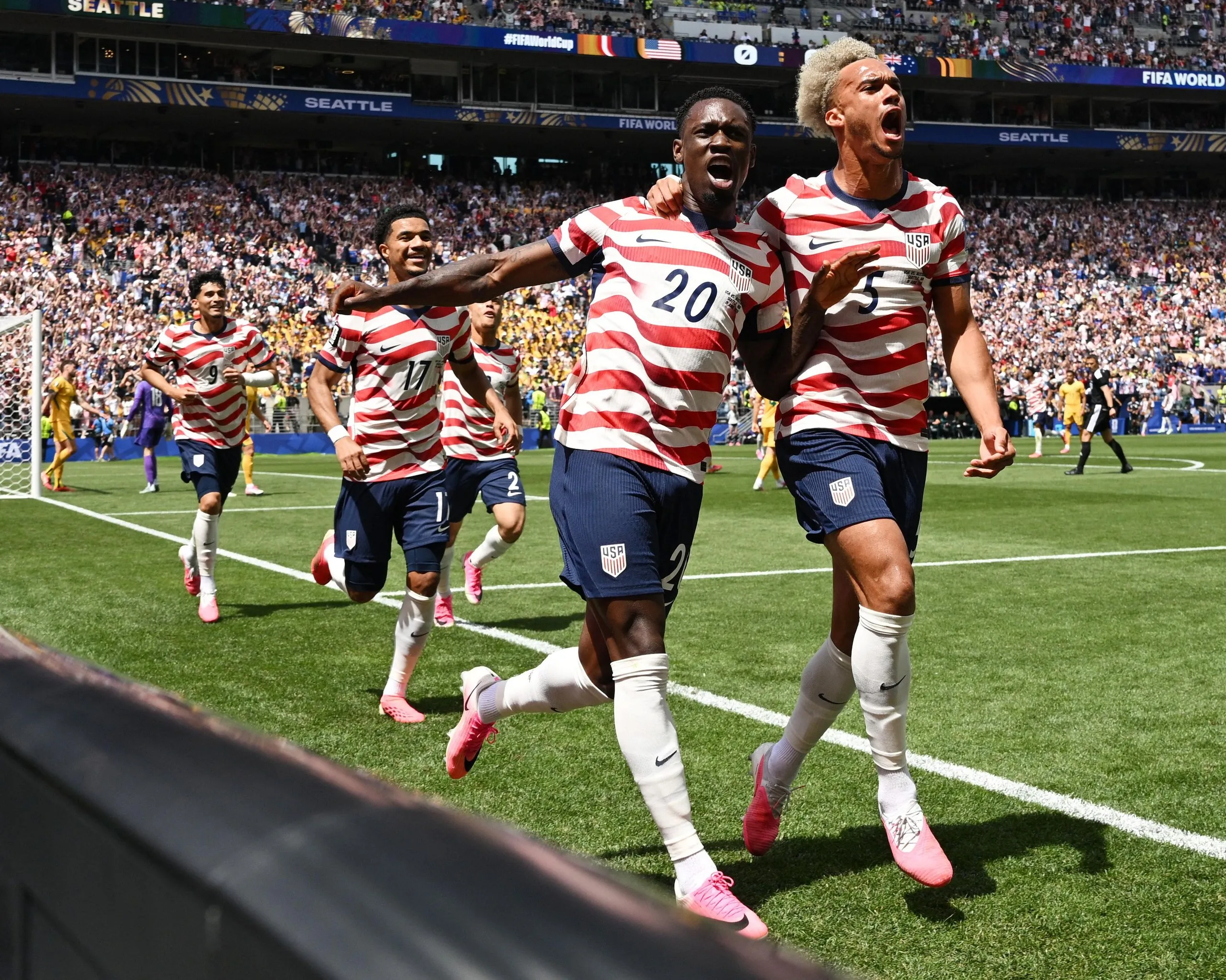 Folarin Balogun and Antonee Robinson celebrate the opening goal.