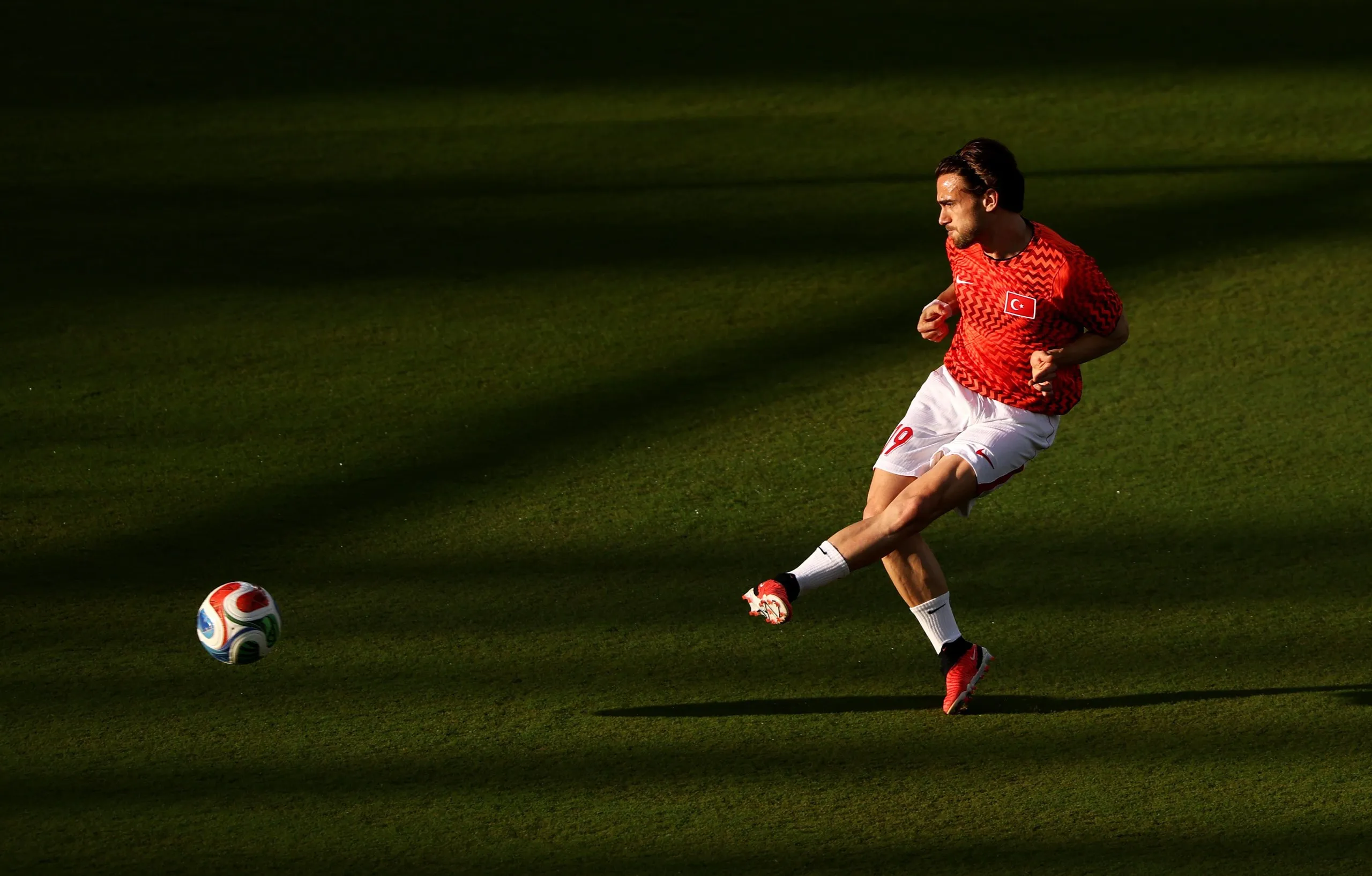 Yunus Akgun (19) of Turkey warms up before today’s Group D match.