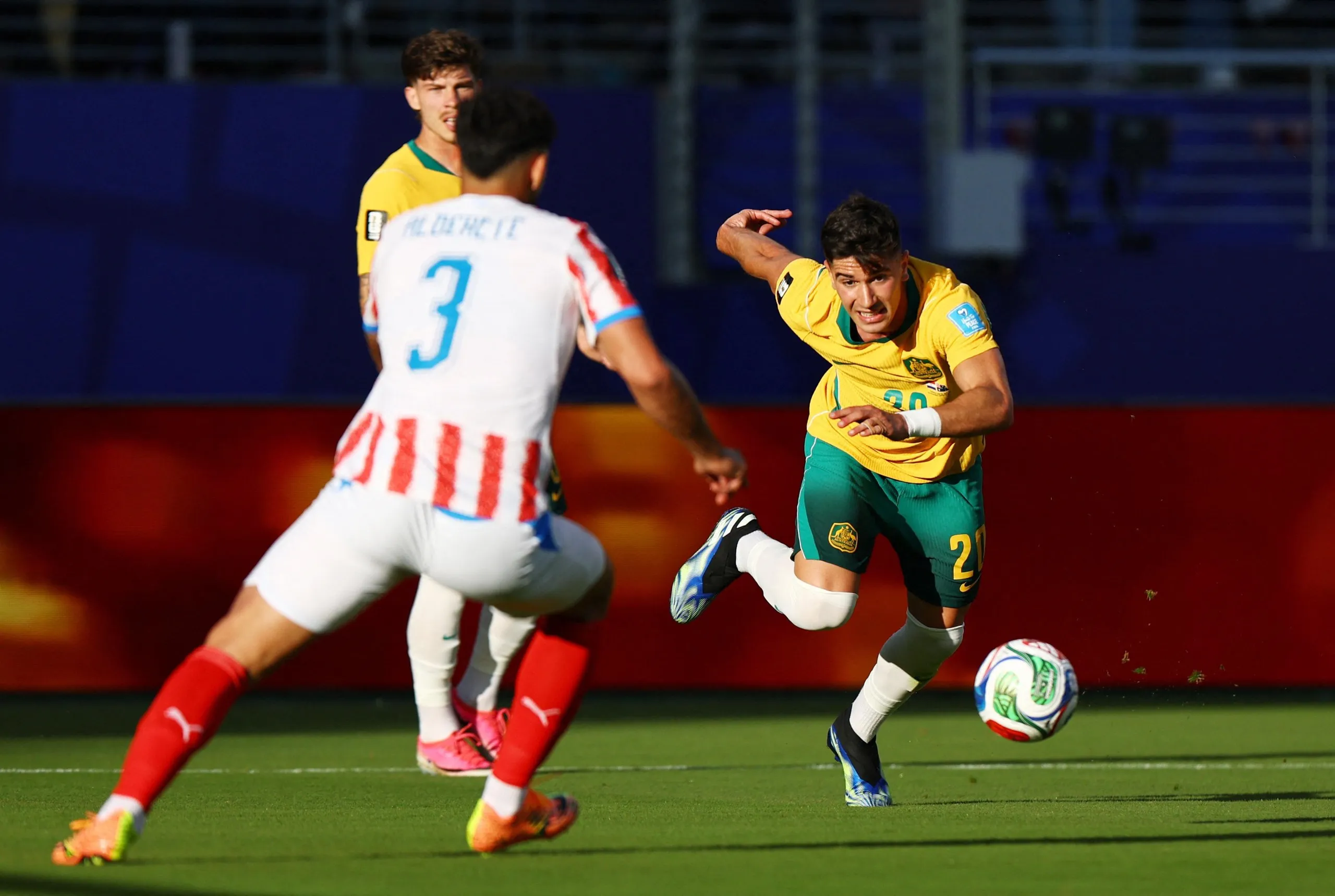 Cristian Volpato looks to take his man on.