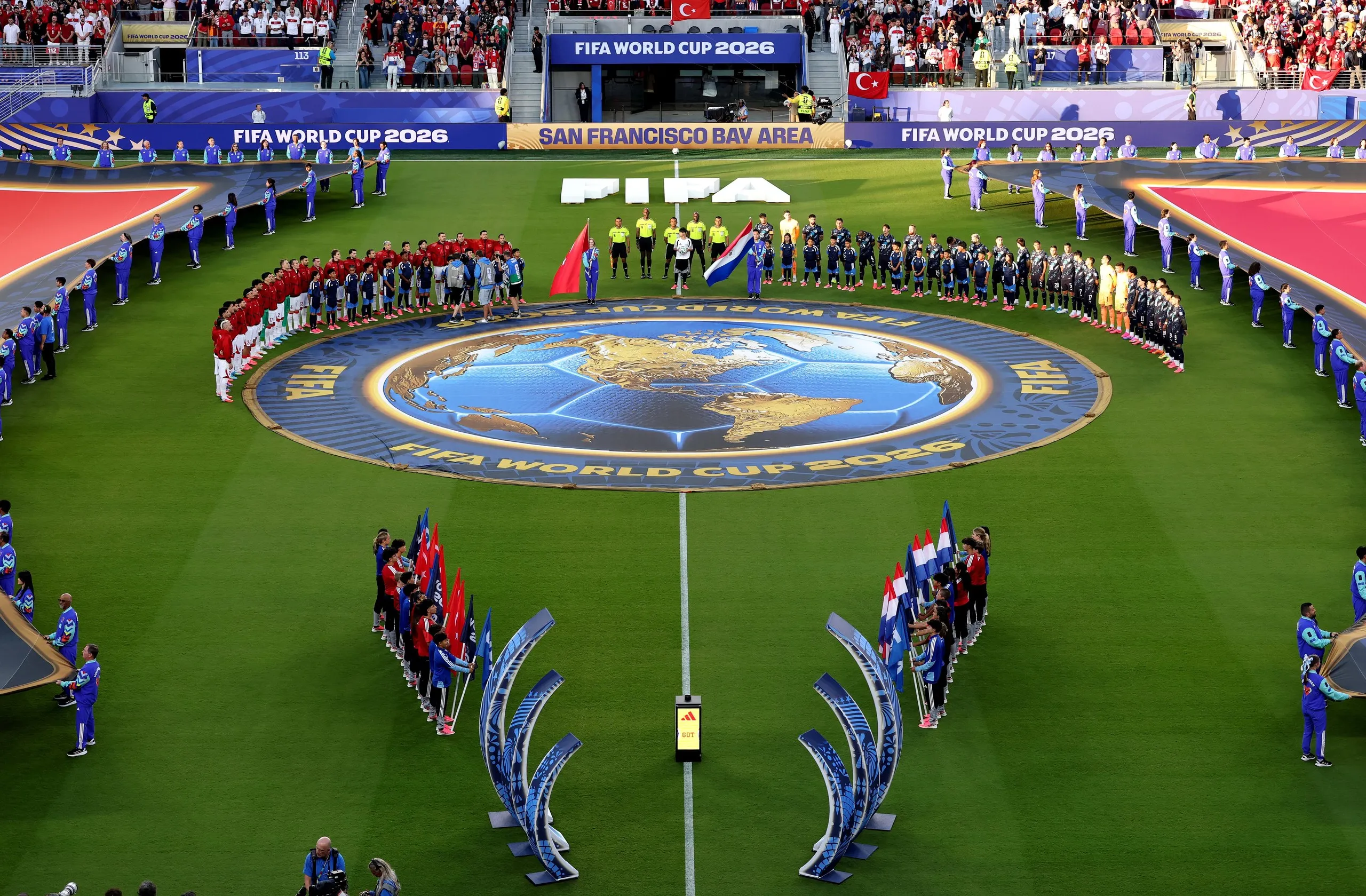 Players line up before before the match