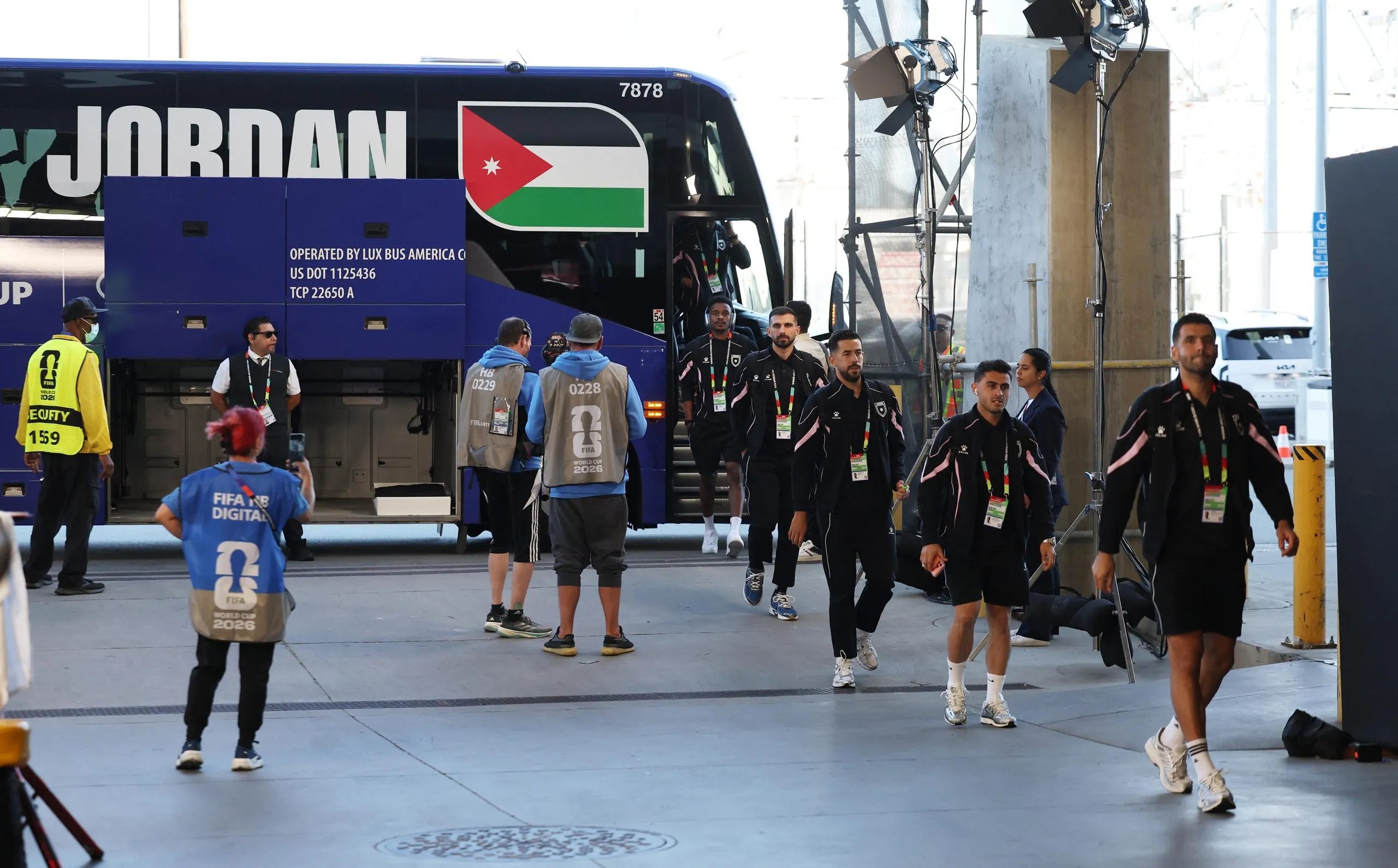 Jordan players make their way into the stadium.