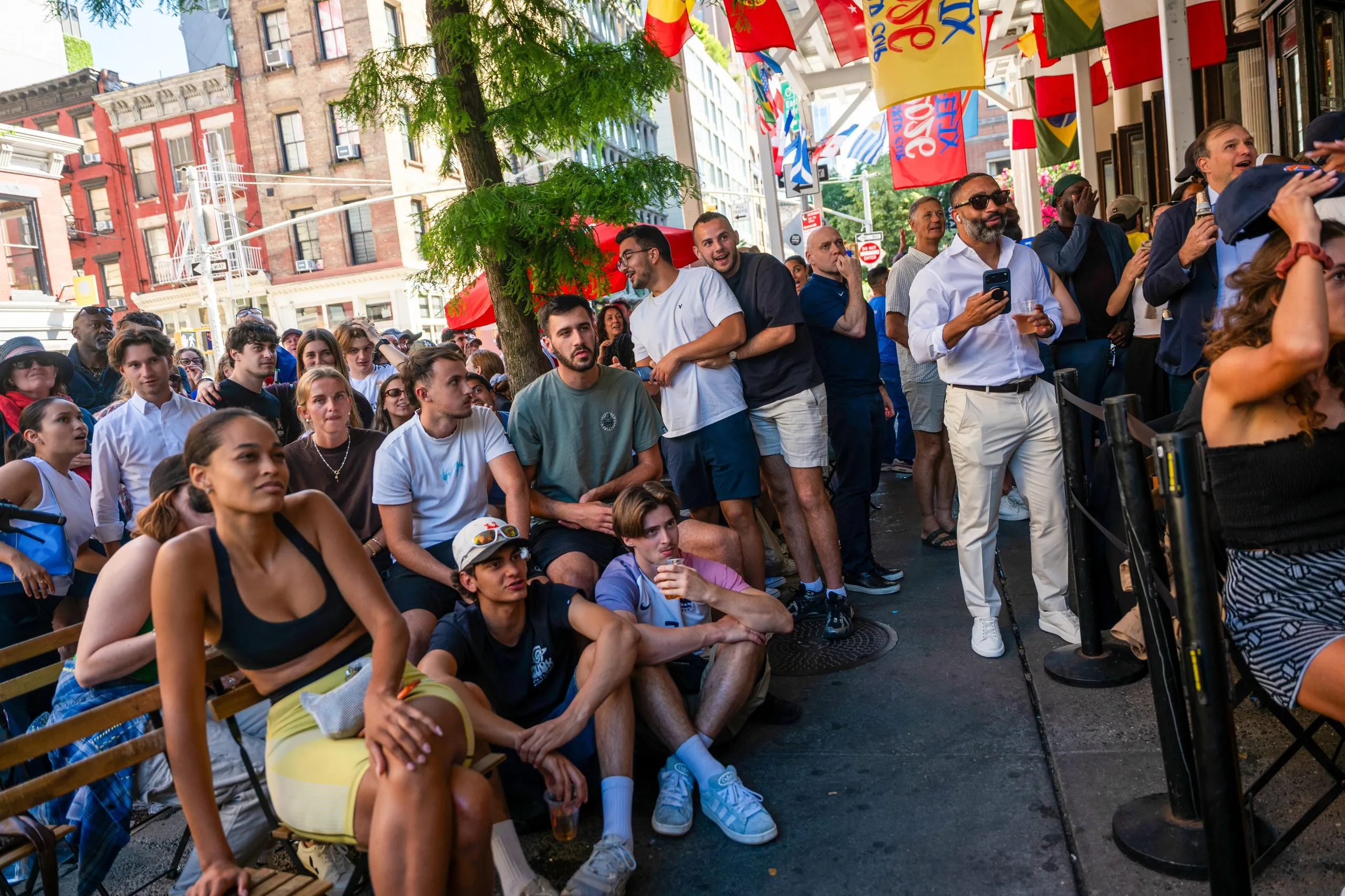 Fans watch the match between France and Senegal at Felix, a longtime French establishment in Manhattan