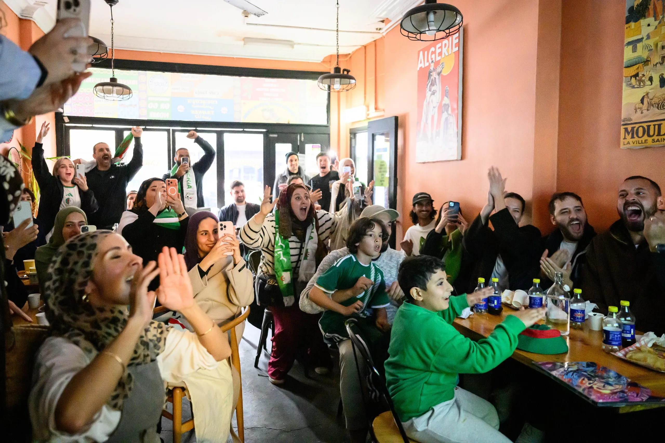 The crowd erupts after an Algeria goal