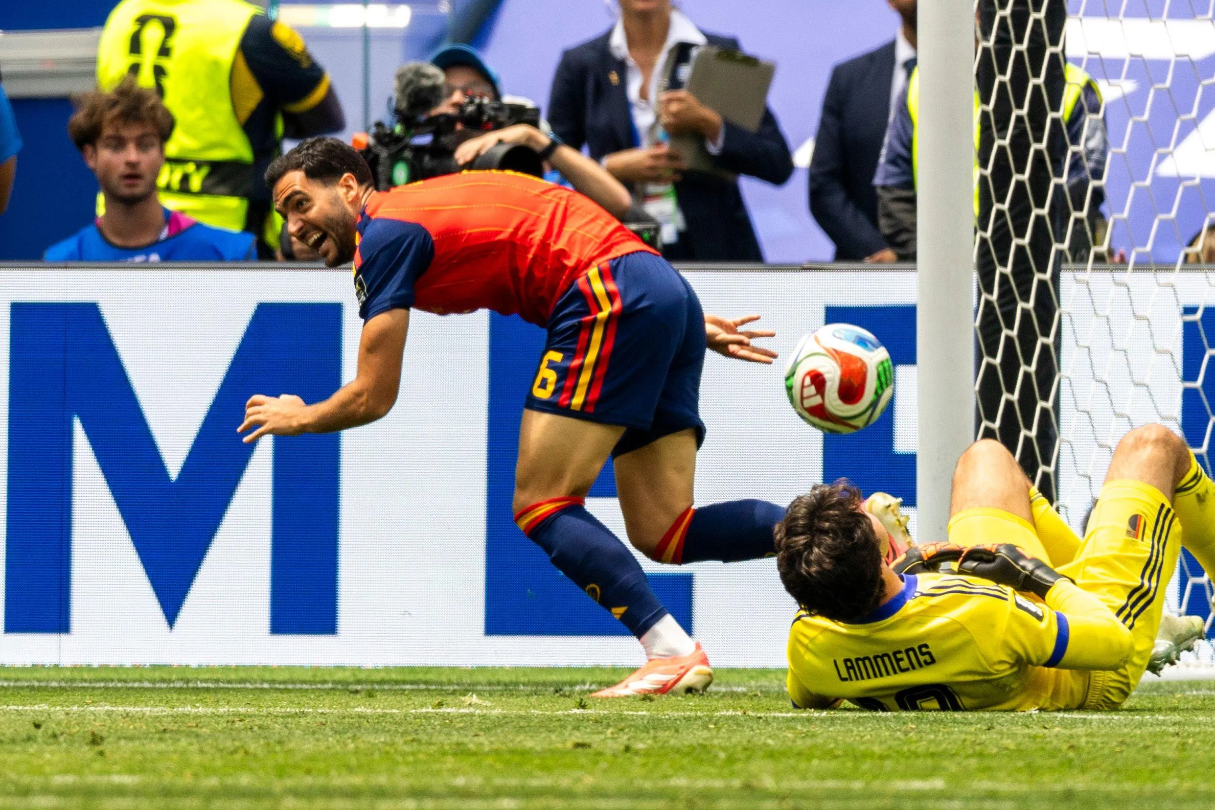 Mikel Merino races away after a late goal against Belgium.