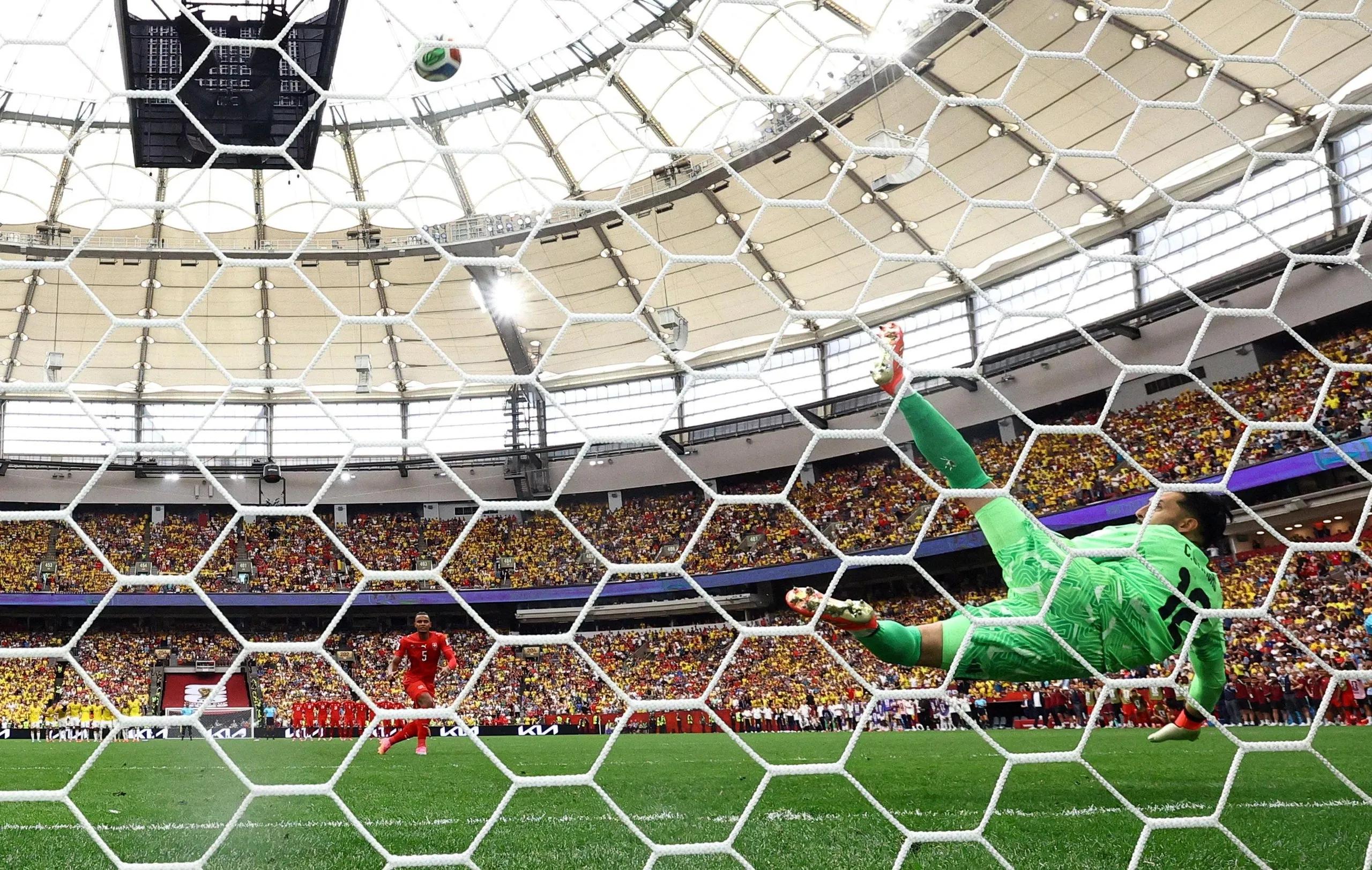 Switzerland’s Manuel Akanji misses a penalty during the shootout against Colombia.