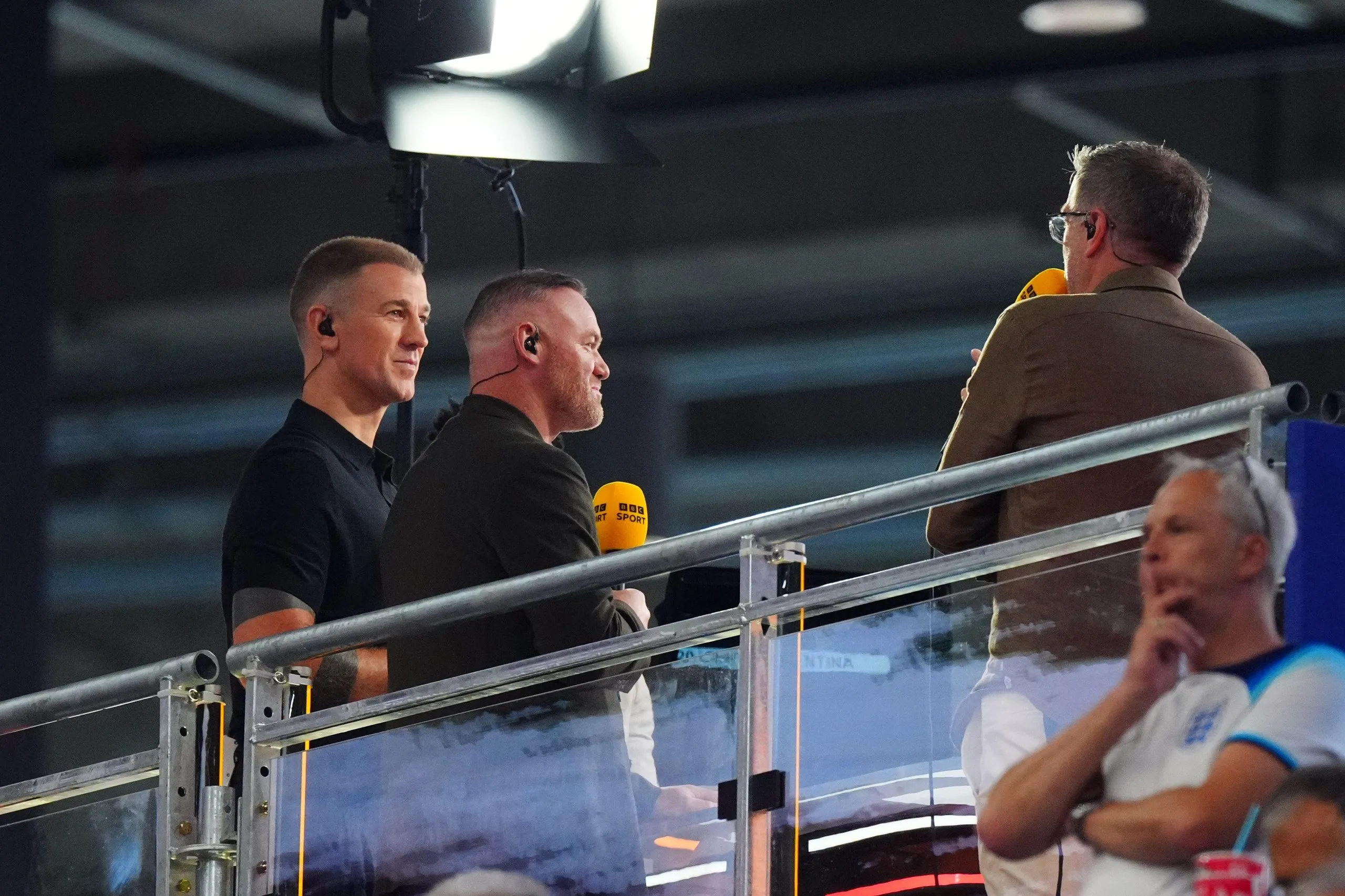 Joe Hart (left) and Wayne Rooney (centre) talk to Mark Chapman in Atlanta during the World Cup semi-final between England and Argentina.